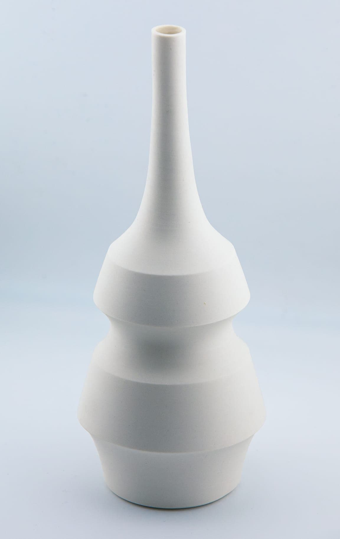 White spindle bottle