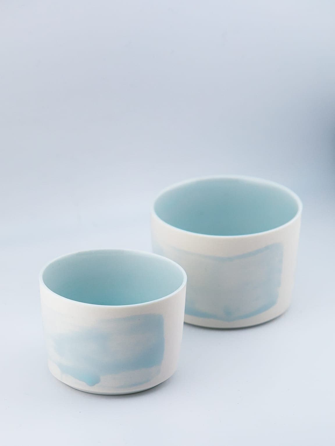 Pale blue cups, pair